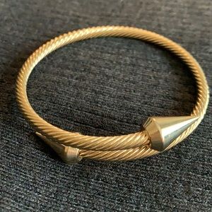 Gold tone spike bangle